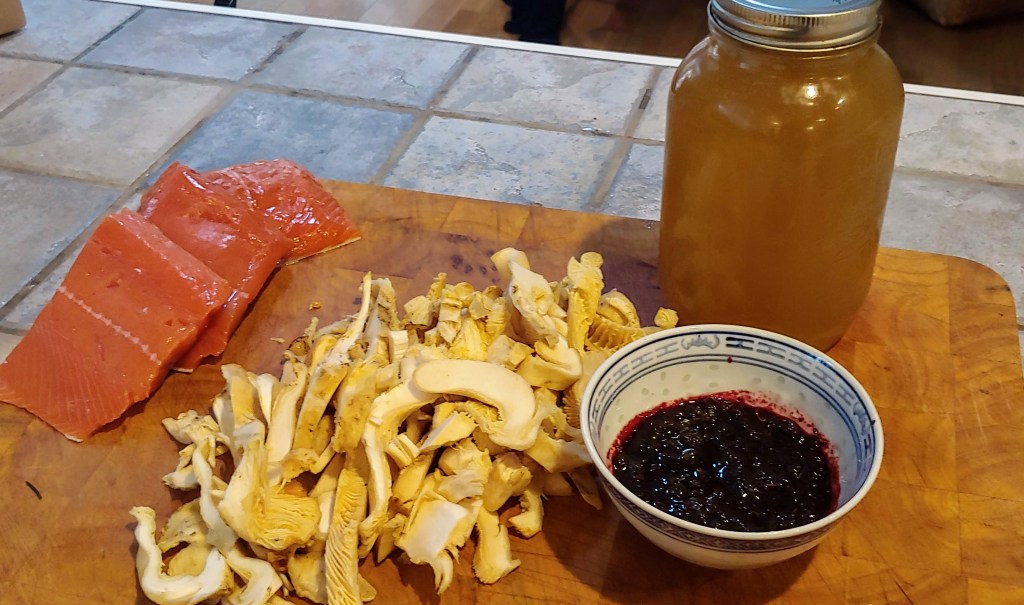 Monday's dinner represented the forage and the hunt. Chanterelles, huckleberry coulis, and venison stock all hunted/gathered/processed by us. Sockeye salmon from the supermarket.